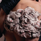 Illustration for article titled This is what a dress made of 3,000 cow nipples looks like